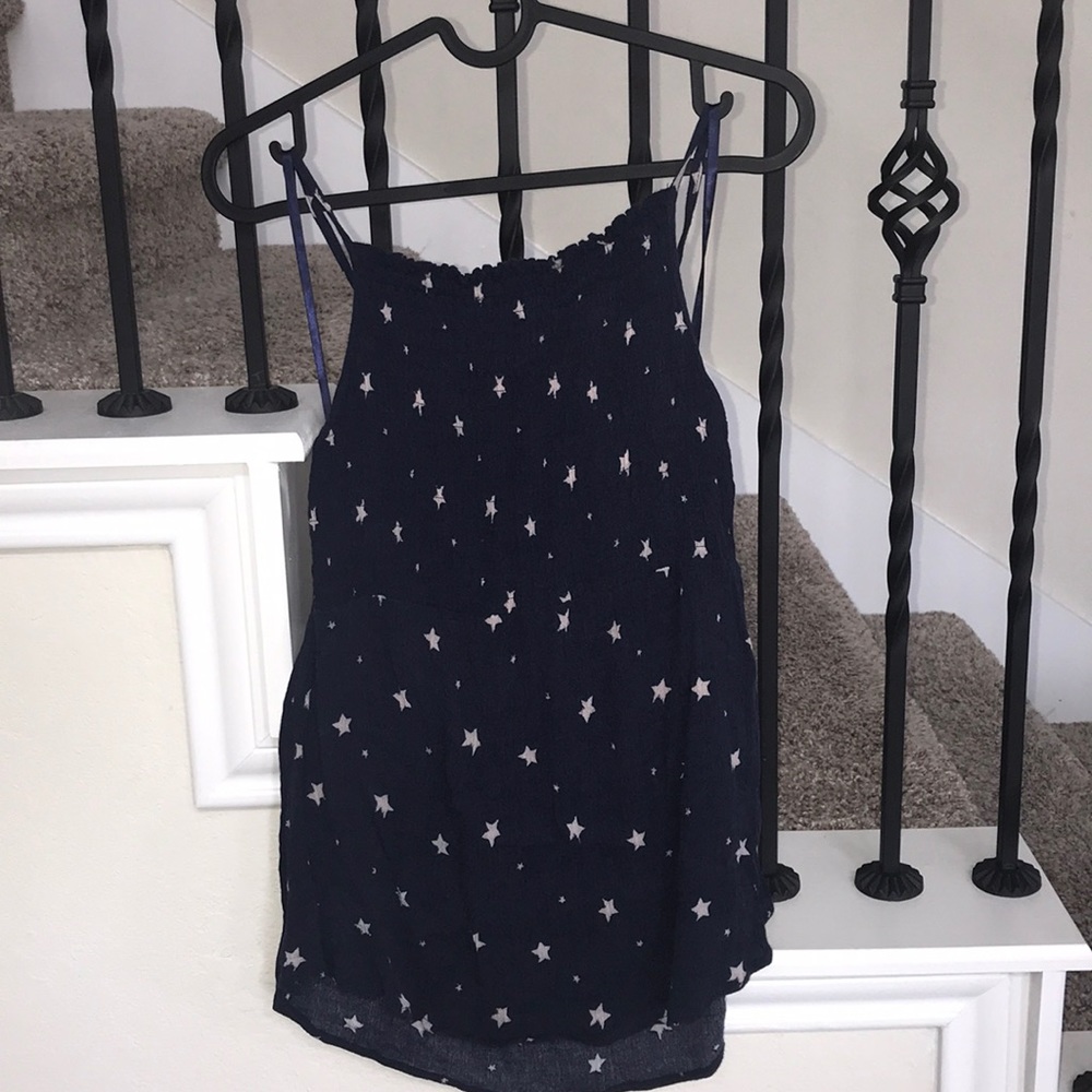 Star patterned peplum top
